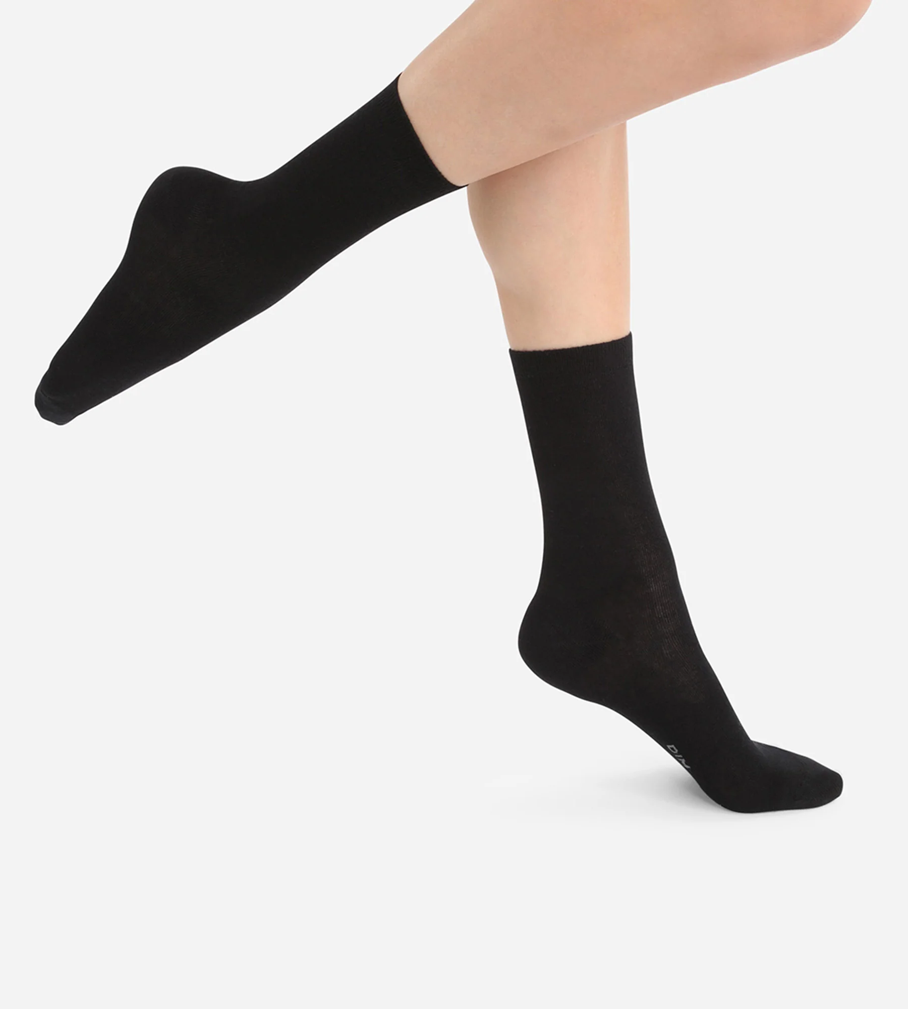Chaussettes unies noires en laine douce Femme
